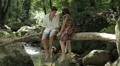 a man holding the hand of a girl and kisses her - romantic scene ,nature HD Footage