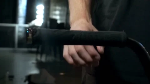 Man holding the handle of a bicycle Video stock 103248211