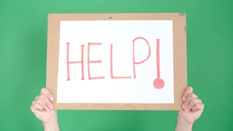 Man holding HELP poster slogan Video stock 236456808