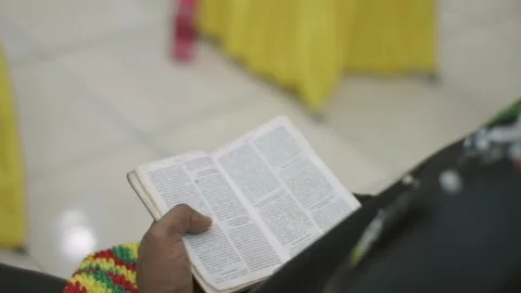 A Man Holding A Holy Bible. Stock Footage