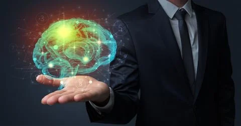 Man holding human brain on his hand Stock Photos