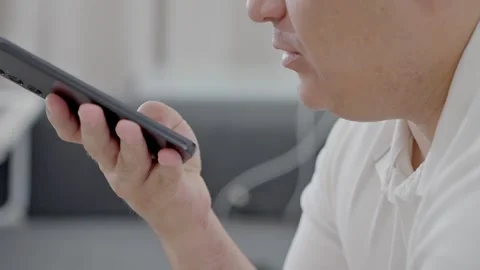 Man holding iPhone with chat application WhatsApp on the screen Stock Footage 307607874