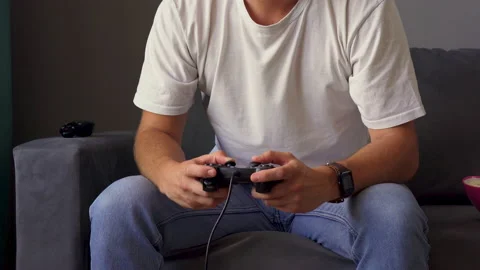 Man holding joystick in both hands Stock Footage 209138766