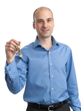 Man holding key Stock Photos