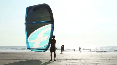 Man holding kite at sandy beach in Goa. Stock Footage 49662841
