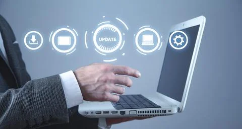 Man holding laptop computer. Update Program. Business, Technology, Internet c Foto stock