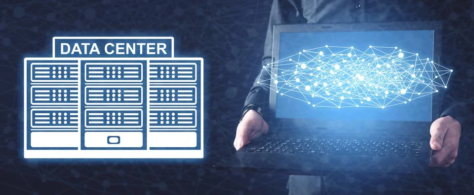 Man holding laptop. Server. Data Center. Technology. Internet Stock Photos