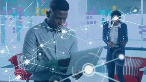 Man holding laptop typing and scrolling, node appearing over laptop showing data Stock Footage 332289052