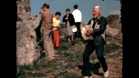 Man Holding Large Rock Stock Footage 278040041