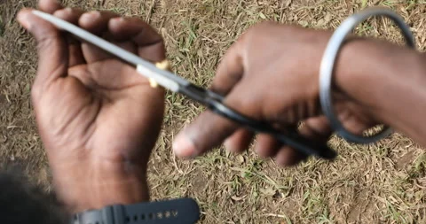 Man Holding Large Scissors Stock Footage 293126937