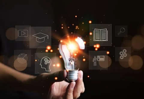 Man holding lightbulb, E-learning graduate certificate program concept. Stock Photos