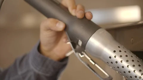 Man holding a looft lighter to ignite fire Video stock 85965018