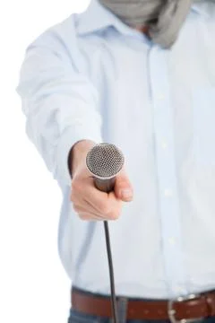 Man holding a microphone Stock Photos