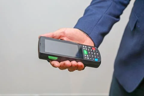 Man Holding Mobile Computer 写真素材