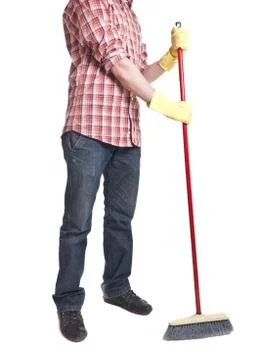Man holding mop in gloves Stock Photos