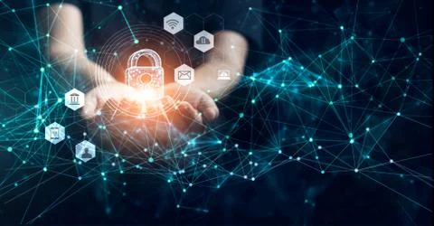 Man holding network security in hands, global. Cyber security and information Fotos de archivo