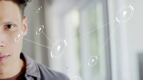 Man holding neutral pose while timed animation forming node network overlay near Stock Footage 333893985
