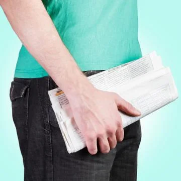 Man holding a newspaper Stock Photos