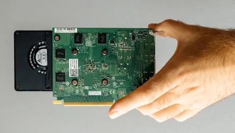 Man holding Nvidia GPU Video card Stockfoto's
