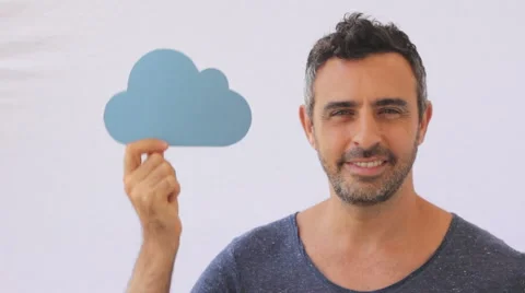 Man holding oaoer cut cloud Stock Footage 40531793