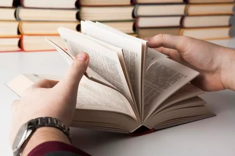 Man holding an open book Foto stock