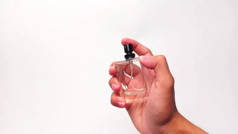 Man holding parfum bottle Stock Footage 295538422