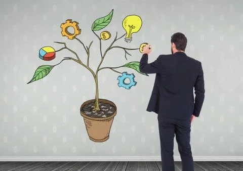 Man holding pen and Drawing of Business graphics on plant branches on wall Stock Photos