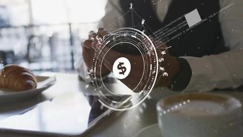 Man holding phone above tablet, tapping and managing money while finance HUD Stock Footage 333574942