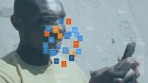 Man holding phone and tapping thumbs making tech icons forming 3D cloud covering Stock Footage 329870500