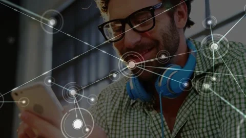 Man holding phone, initial node appearing on screen, animated network expanding Stock Footage 333004370