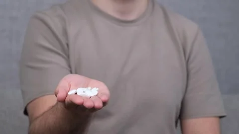 Man holding pills Stock Footage 269129052