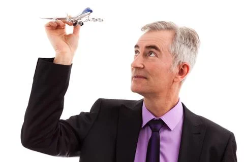Man holding plane Stock Photos