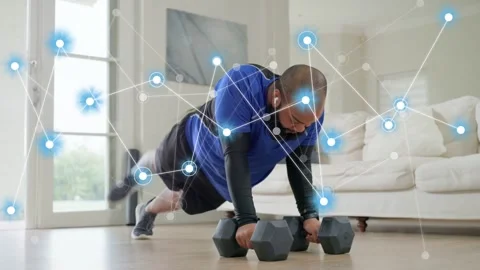 Man holding plank and starting dumbbell rows, blue node net appearing and 動画素材 333414029