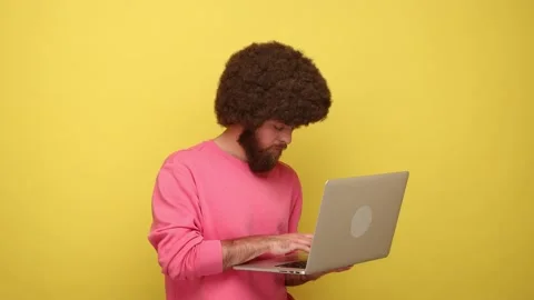 Man holding portable computer in hands, thinking about new projects, working 動画素材 170718408