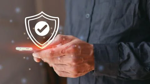 Man holding protective shield icon. Protection of telephone network securit.. Stock Photos