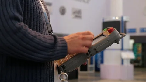 Man holding remote control for robotics arm technowelding on industry Stock Footage 71703650