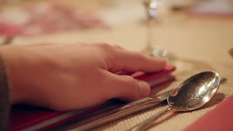 Man holding a restaurant  menu, deciding what to eat, healthy lifestyle Stock Footage 263931702