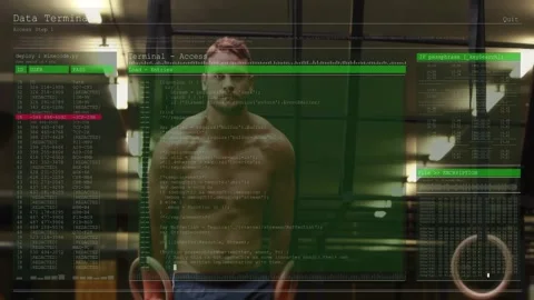 Man holding rings holding support, Data Terminal overlay fading in showing Stock Footage 323480143
