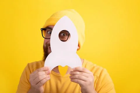 Man holding rocket Stock Photos