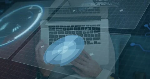 Man holding round device, rotating and testing on laptop while tech UI tracking Stock Footage 329114919