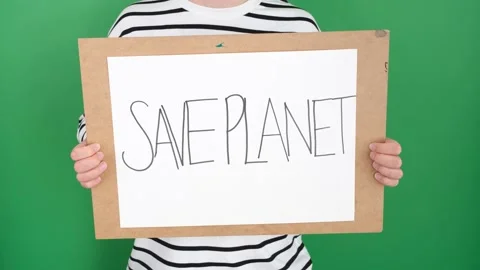 Man holding save planet poster slogan Stock Footage 236457155