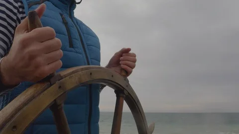 Man holding ship wheel. Stock Footage 121372216
