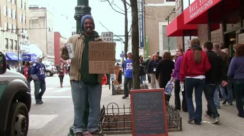 Man holding sign asking for Beer Money Stock-Footage 10741207