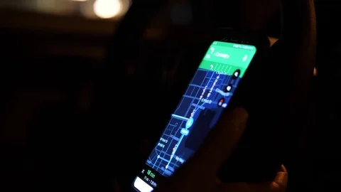 Man holding smart phone figuring out GPS close up Stock-Footage 81889019