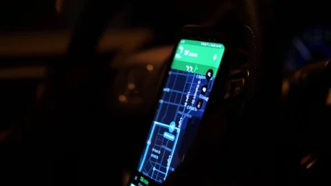 Man holding smart phone using GPS while moving Stock Footage 81889105