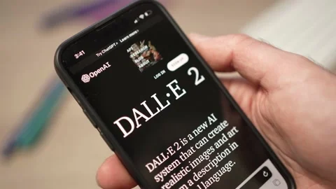 Man Holding a Smartphone With DALL-E 2 Artificial Intelligence App Stock Footage 229677390