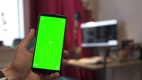 Man holding smartphone with green screen Stock Footage 201486602
