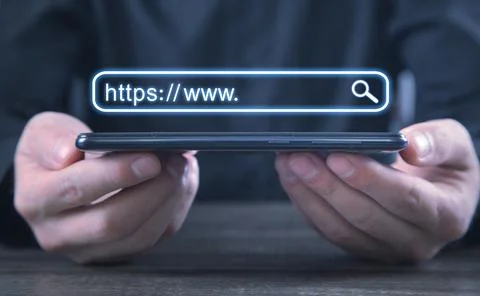 Man holding smartphone. Https address. Internet search concept Stock Photos