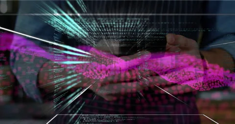 Man holding smartphone in tech scene, displaying streaming green code and pink Stock Footage 307449419