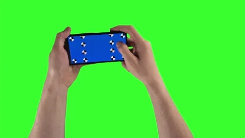 Man is holding smartphone by two hands and swiping up on display with tracking Stock Footage 157327052